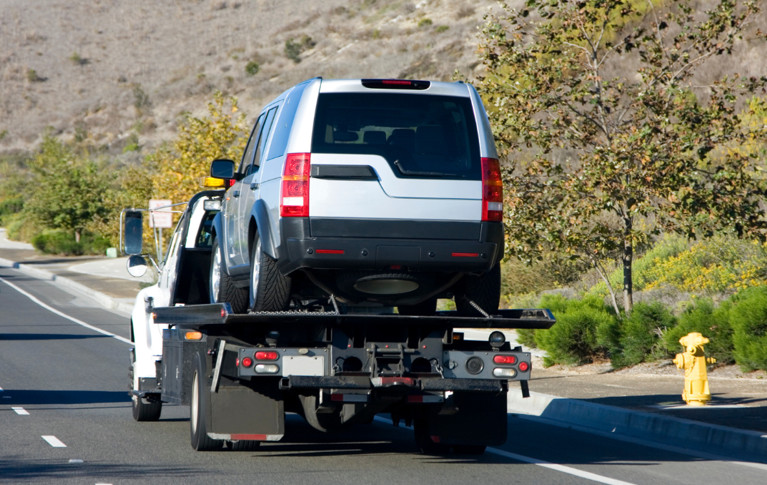 fraudulent towing company